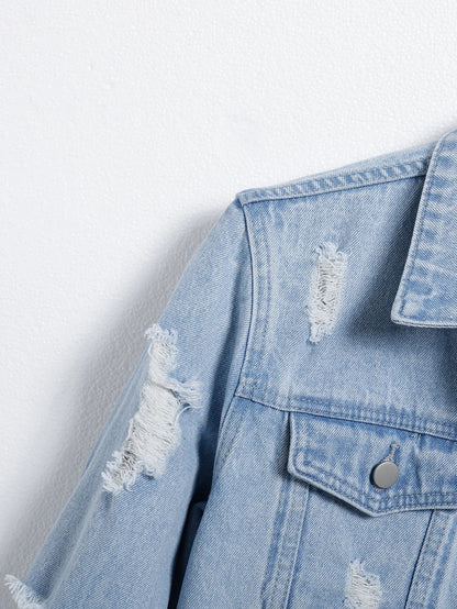 Men's light blue ripped denim jacket. Stylish and trendy. Street casual.