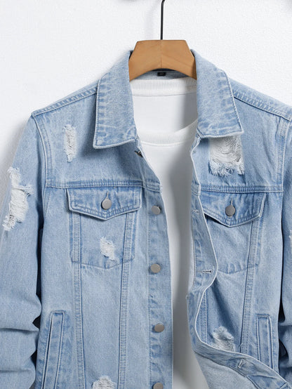 Men's light blue ripped denim jacket. Stylish and trendy. Street casual.