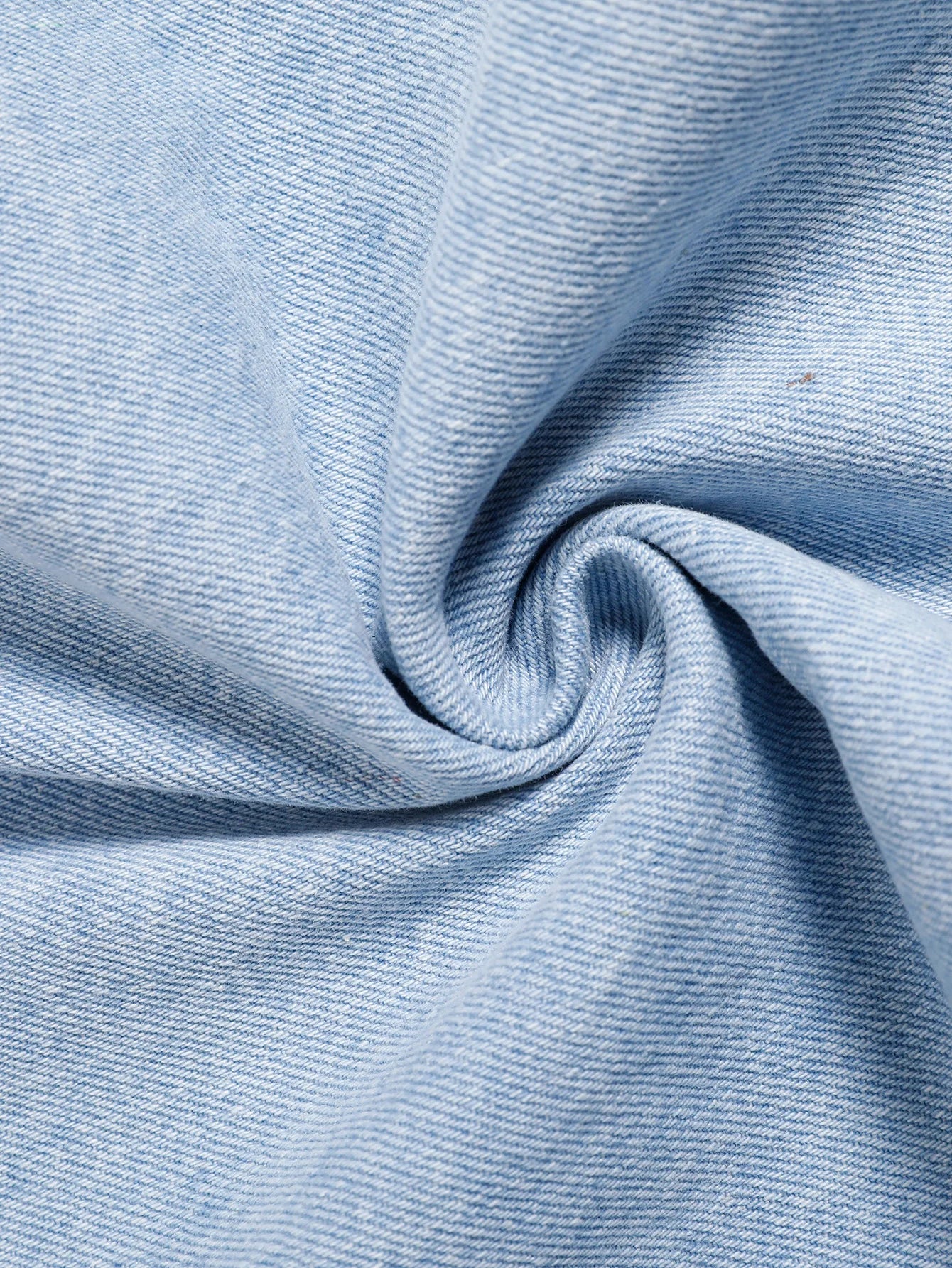 Men's light blue ripped denim jacket. Stylish and trendy. Street casual.