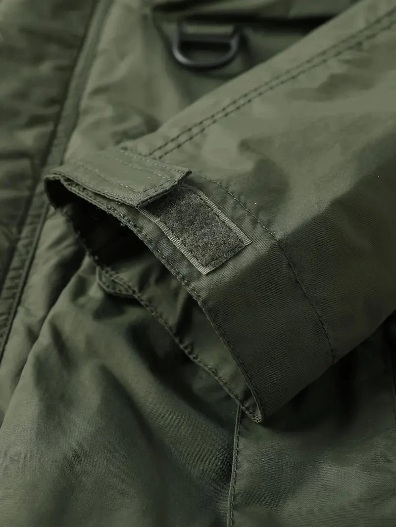 Detachable windproof sleeved hooded jacket suitable for outdoor activities men's casual waterproof multi pocket jacket vest