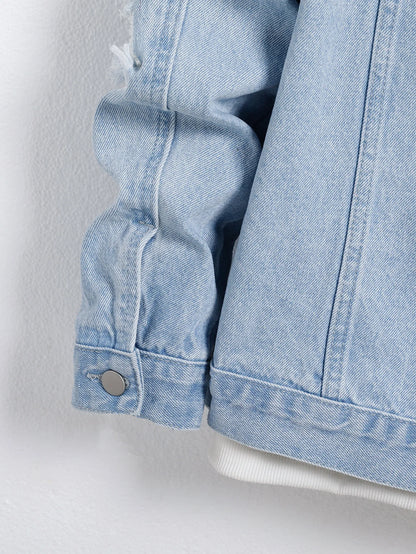 Men's light blue ripped denim jacket. Stylish and trendy. Street casual.